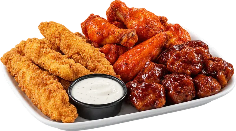 Platter of sauced bone-in wings, glazed boneless wings and chicken tenders with ranch (illustrative photo)